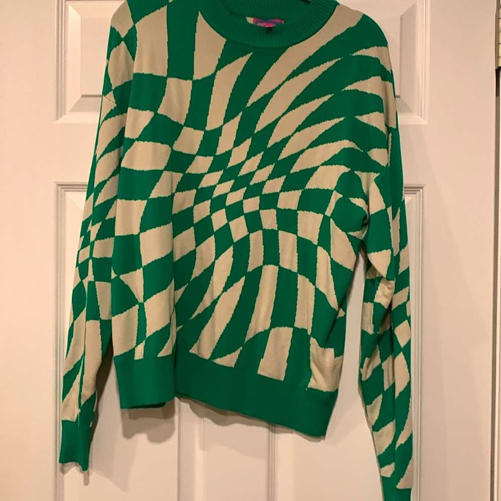 Green and tan sweater